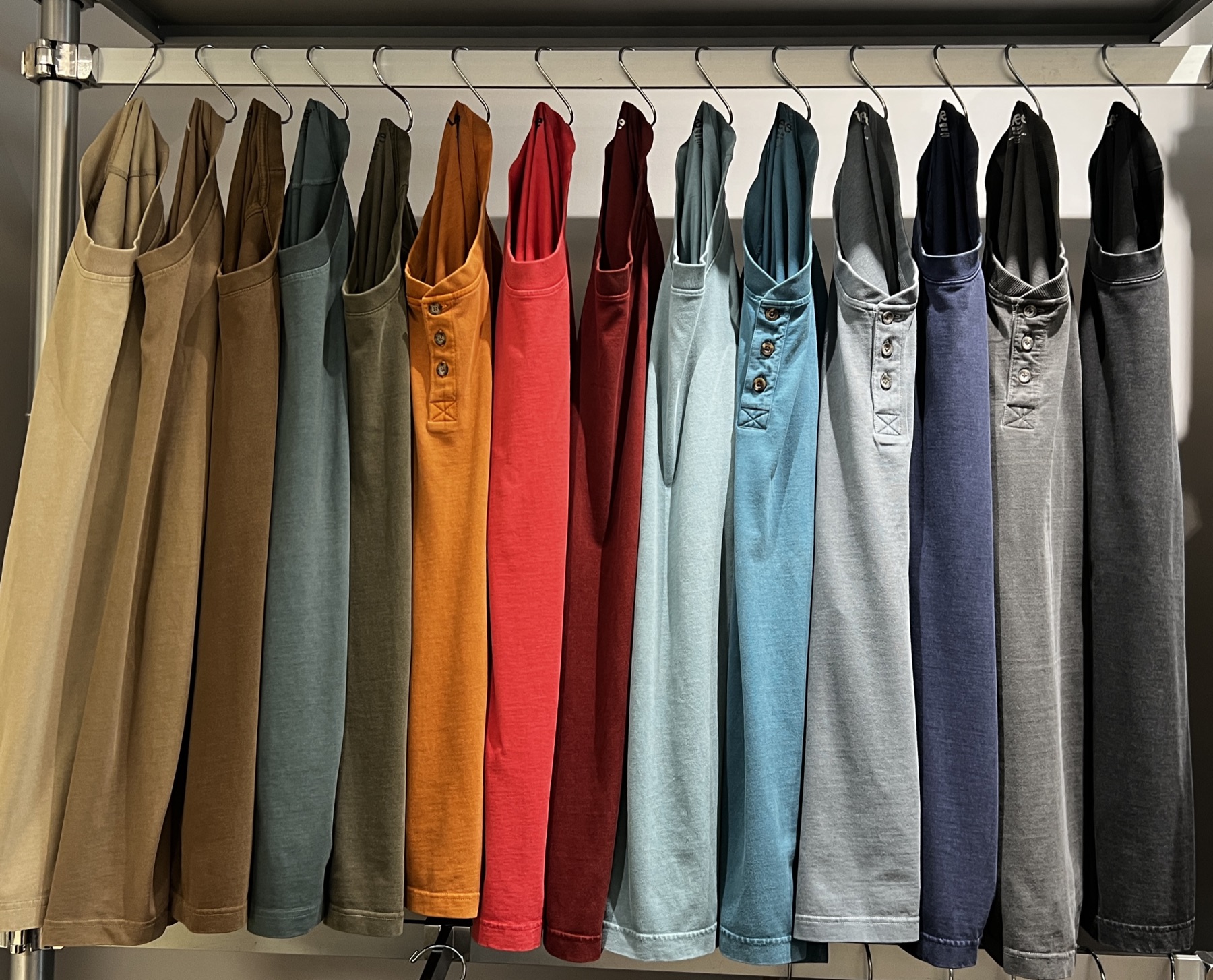Lee men's henley color range on a showroom rack